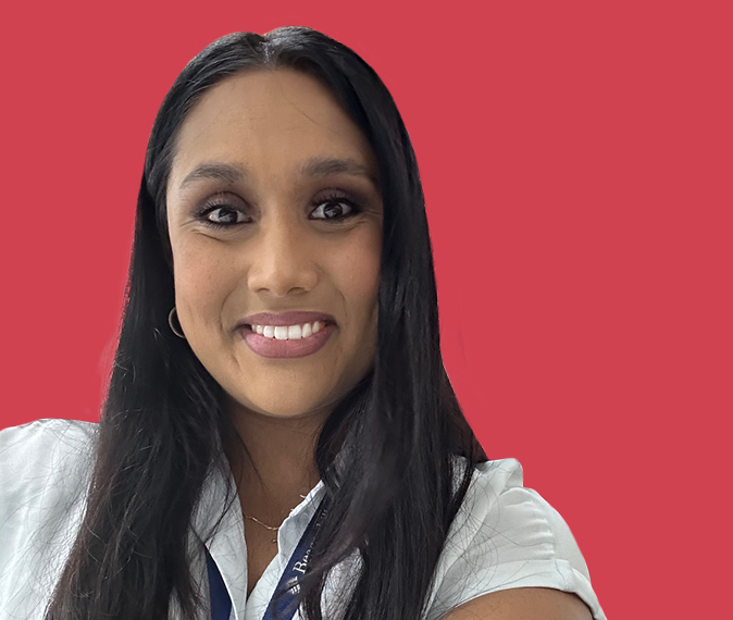 Natasha Muller - headshot of woman with long dark hair smiling at the camera